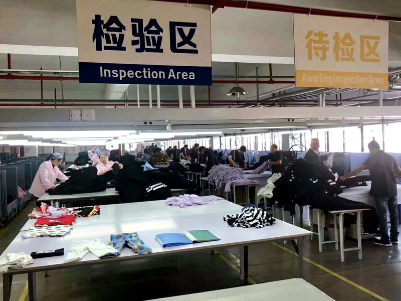 Inspection area checking finished garments before packing